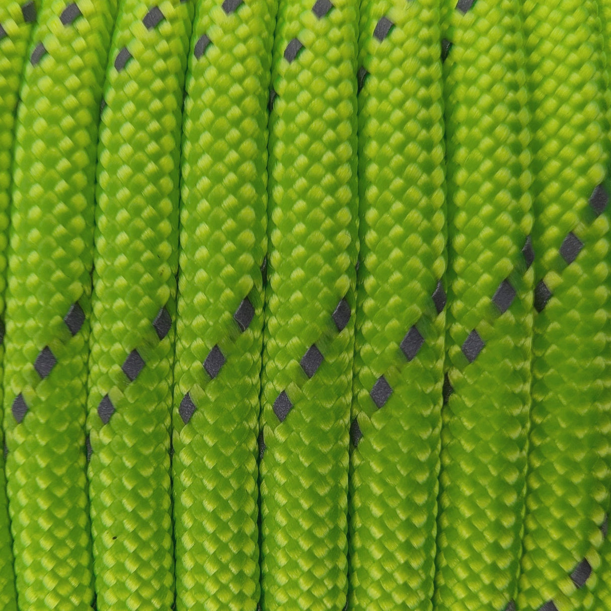 Close-up of the woven sheath on Reflective Fluro Green Paracord 550, showing 4mm braid