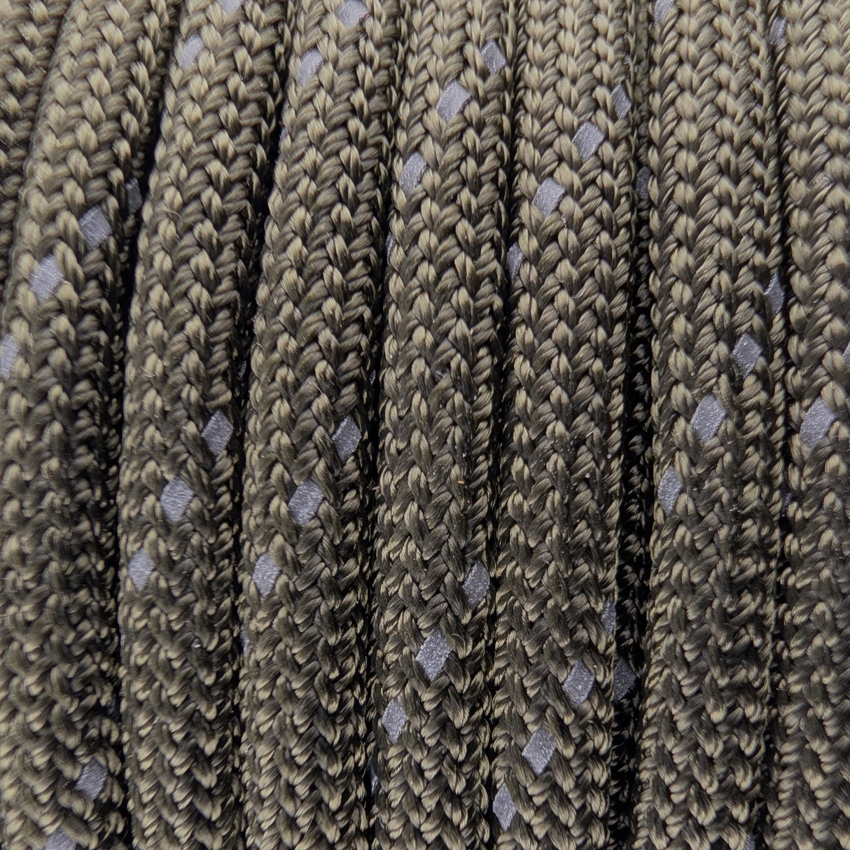 Close-up of the woven sheath on Reflective Olive Paracord 550, showing 4mm braid