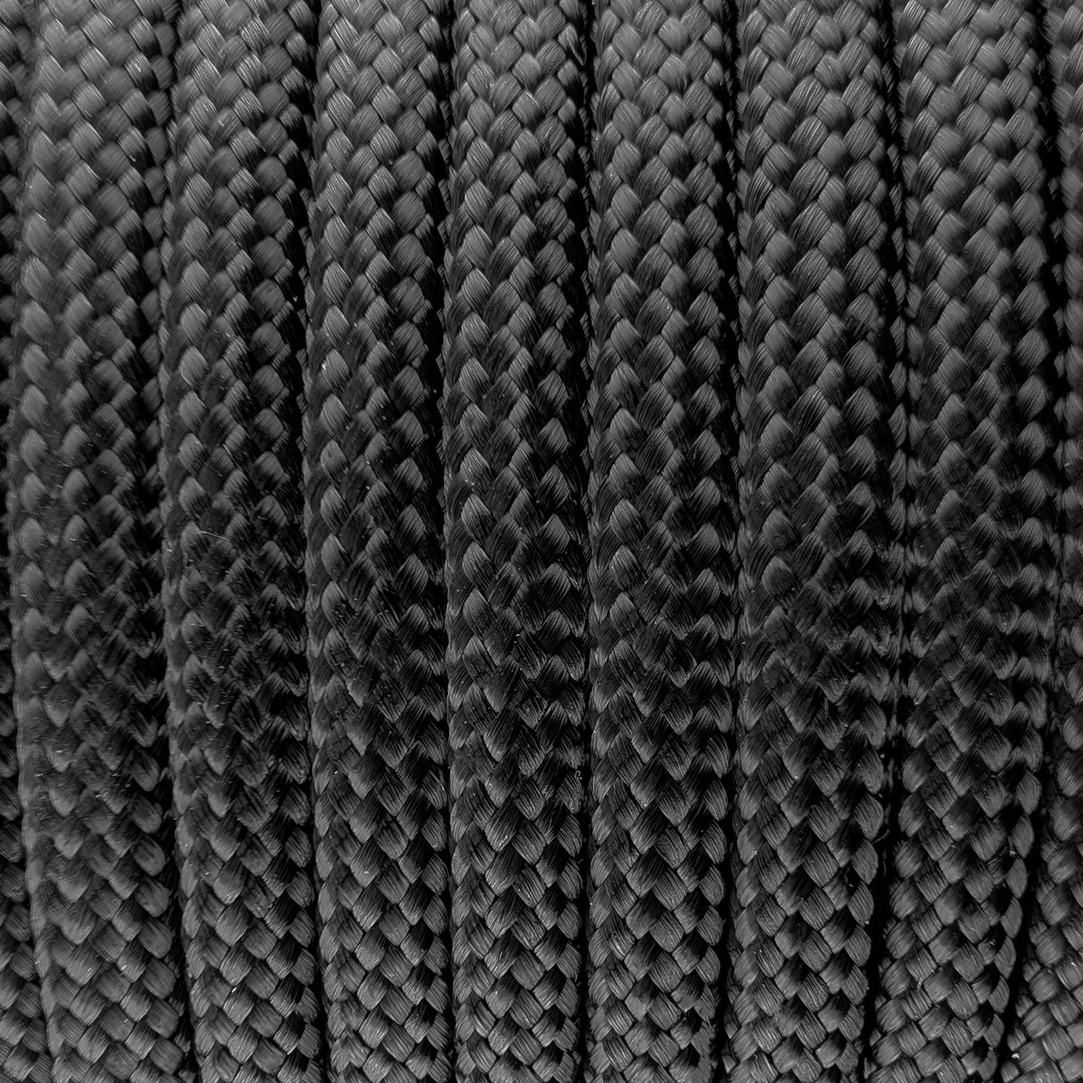 Close-up of the woven sheath on Black Paracord 550, showing 4mm braid
