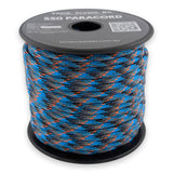 Blue Jungle Paracord 550 — 4mm Type III nylon spool, vivid blue with charcoal and orange urban-camo flecks, 7-strand core
