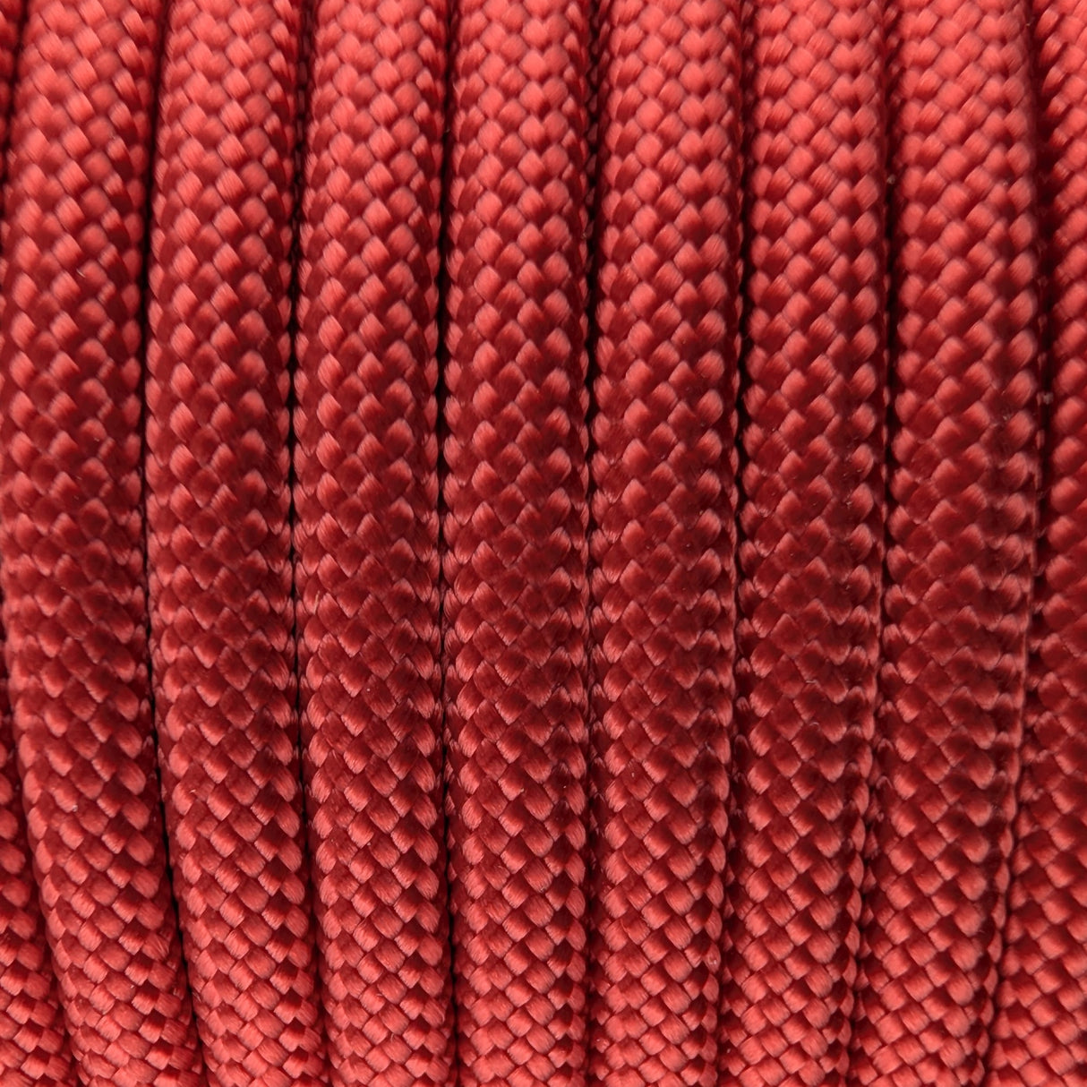 Close-up of the woven sheath on Red Paracord 550, showing 4mm braid