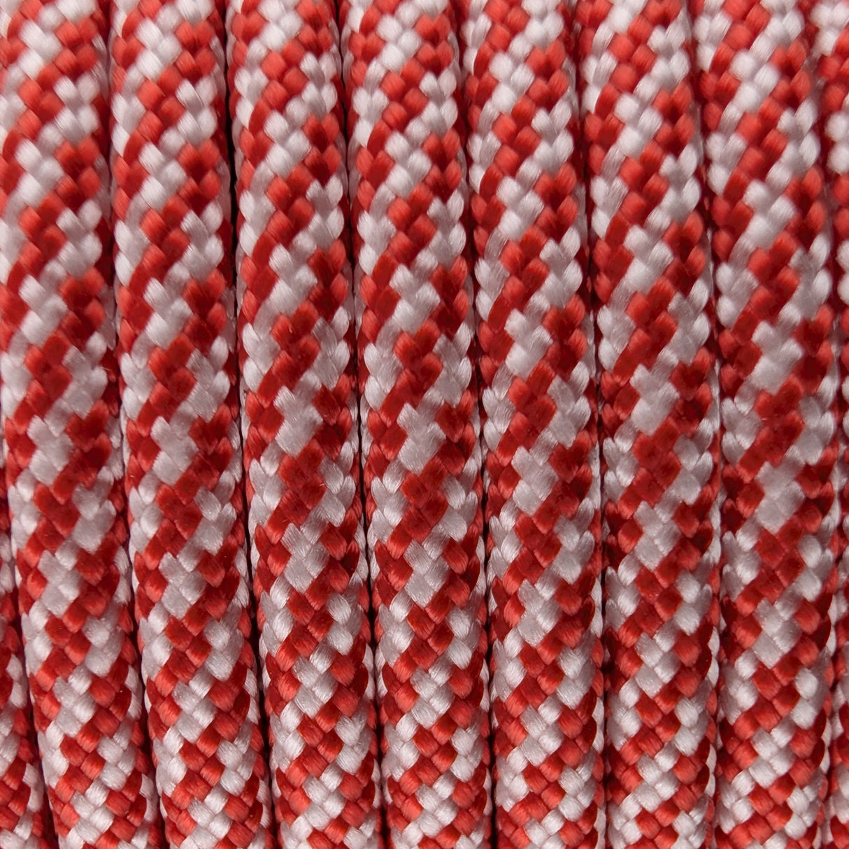 Close-up of the woven sheath on Red White Spiral Paracord 550, showing 4mm braid