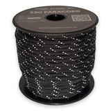 Reflective Black Paracord 550 reflective tracer illuminated under torchlight