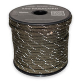 Reflective Olive Paracord 550 reflective tracer illuminated under torchlight