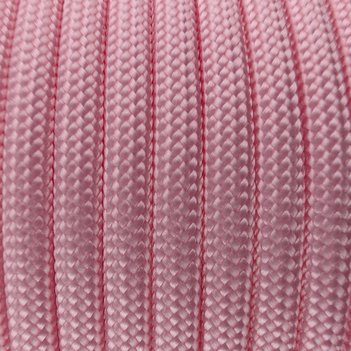 Close-up of the woven sheath on Salmon Paracord 550, showing 4mm braid